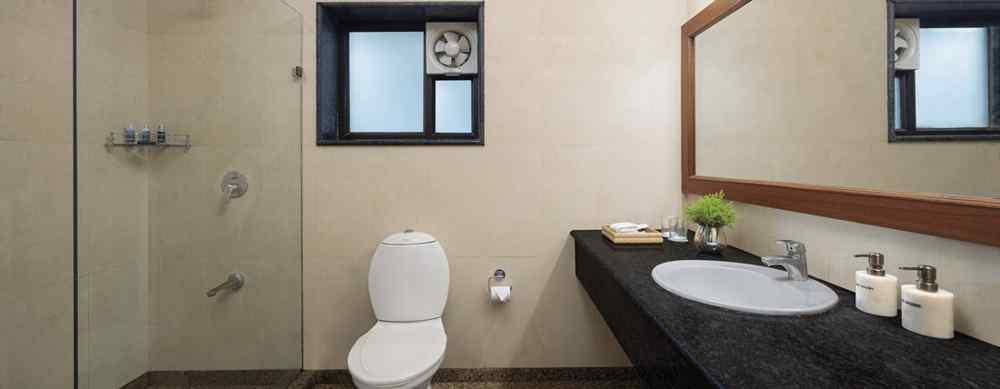 Spacious bathroom at The Riverview Retreat Corbett featuring shower area toilet and modern fixtures