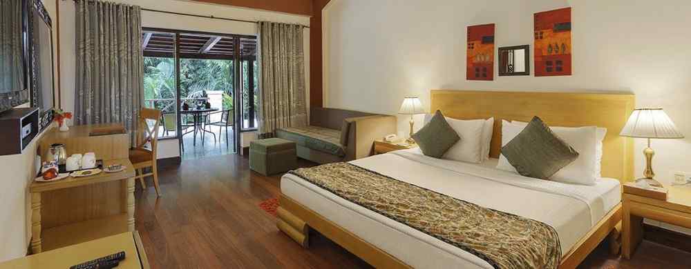An image of a bedroom with king size bed, wooden ceiling where a fan is hanged,  cabinet and tables, etc. - The Riverview Retreat, Corbett