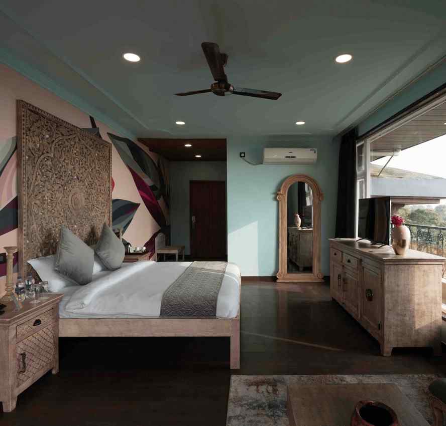 An image of modern bedroom with a king-size bed and stylish decor - atman, Dharamshala