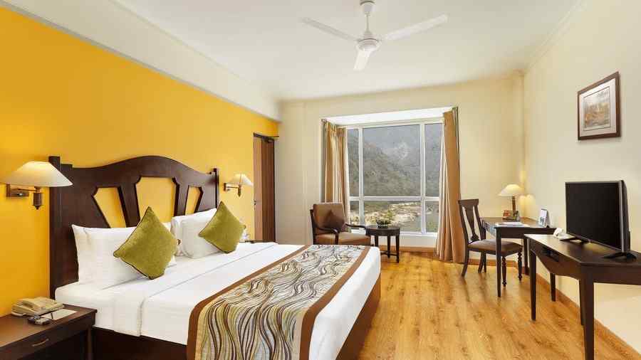 Two Bedroom Standard Apartment facing Gardens and Hills with a large bedroom and a television and workdesk - Aloha On The Ganges, Rishikesh